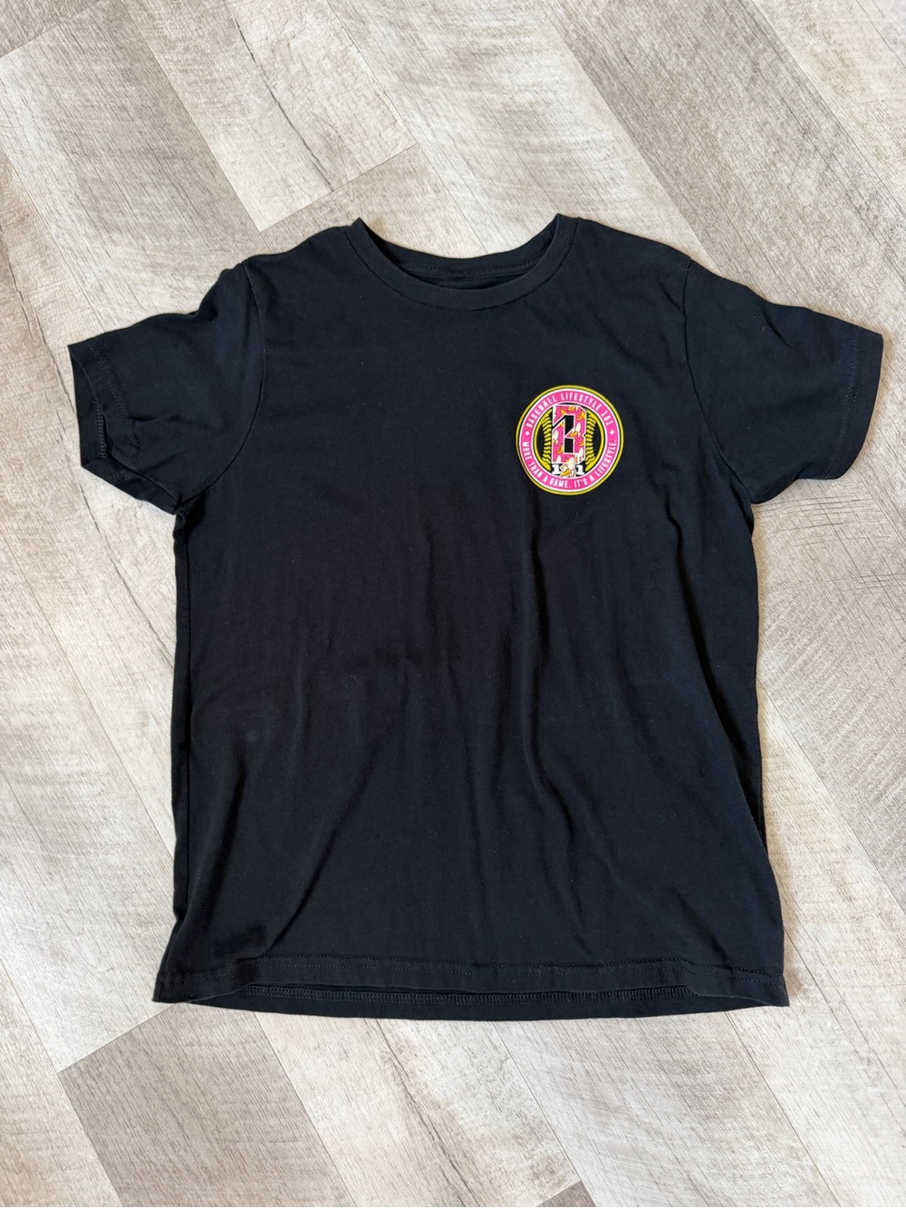 Black Short-Sleeve Tee with Pink & Yellow Badge